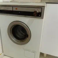یک ماشین لباسشویی آاگ و ست مبلمان ۷ نفره