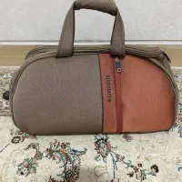ساک مسافرتی سبک چرخ دار دسته آلومینیوم