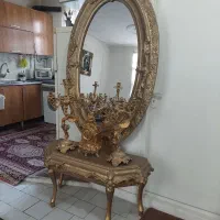 آینه و کنسول سلطنتی همراه شمعدان و ساعت دکوری