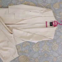 یک لباس پاییزه یک کت شلوار یک پالتو