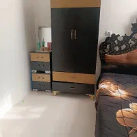 تخت خواب و کمد