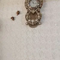 ساعت دیواری طلایی شیک