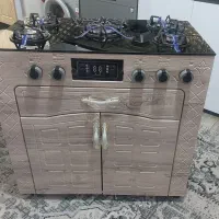 اجاق گاز کابینتی طرح فر نو اکبند پنج شعله صفحه شیش