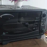 توستر کاملا سالم فقط سریکی پیچ شکسته