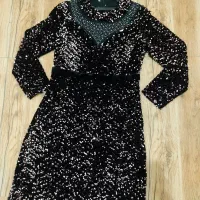 تعدادی لباس نو و مجلسی