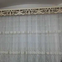 پرده ی تور همراه با کتیبه