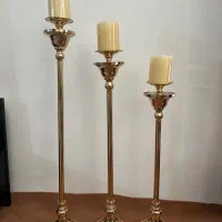 شمعدان پایه بلند طلایی