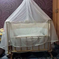 فروش گهواره کنار تخت مادر