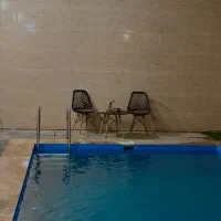 ویلا با استخر سرپوشیده آب گرم|اجارهٔ کوتاه‌مدت ویلا و باغ|کرج, ساماندهی|دیوار