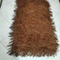 یک عدد فرش قهوه‌ای کوچک در حد نو مال هند