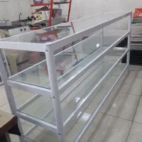 میزپیشخوان میزویترین فروشگاه موبایل عطرادکلن..