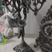 ساعت و شمعدانی