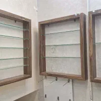 دکور مغازه  mdfگلاسه براق ابعاد همراه با شیشه ردیف