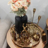 سینی و اکسسوری و گلدون و جاشمعی