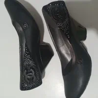 کفش مجلسی|کیف، کفش، کمربند|رشت, پیرسرا|دیوار