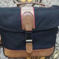 دوربین عکاسی و مشعلی پلوس