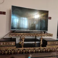 میز تلویزیون و ساعت ایستاده برنز