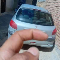 ماشین ۲۰۶ رنگ نقرای آبی مدل ۸۵ دور رنگ بدون ضربه