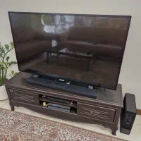 تیوی و میز و اینه وکنسول و سطل و جادستمال