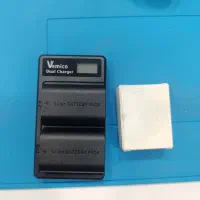 باتری دوربین کانن با شارژر