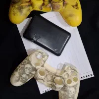 جلد دسته + عدد پاور بانک