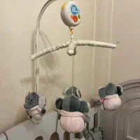 اویز تخت کودک موزیکال چرخشی