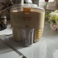 ابمیوه گیری اسنوا با گوشکوب برقی فروش فوری