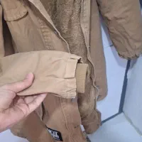 پالتو|لباس|مشهد, شهید معقول|دیوار