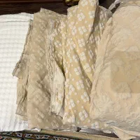 تعدادی پارچه ژاکارد و پلیسه مناسب مزون