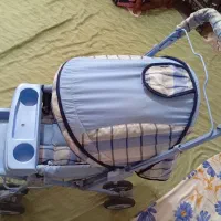 کالسکه و نینی لای لای
