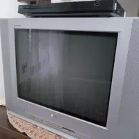 تلوزیون ال جی به همراه دی وی دی سی دی خور