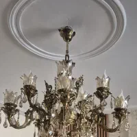 لوستر برنجی 10 شاخه به همراه دیوارکوب 2 شاخه