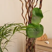 گلدان شیشه ای باگیاه مصنوعی