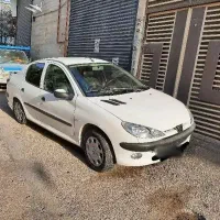 پژو ۲۰۶ سفید اس دی وی هشت تیو فایو خیلی کم کار