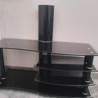 میز تلویزیون شیشه ای بسیار تمیز