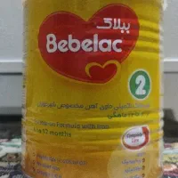 قوطی شیرخشک همراه با درب پلاستیکی