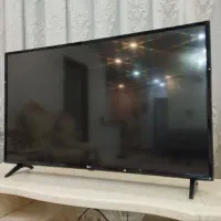 تلویزیون  ۴۳ اینچ الجی و میز تلویزیون