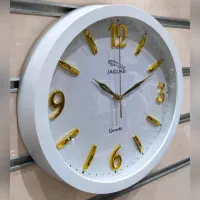 ساعت دیواری طرح چوبی جگوار