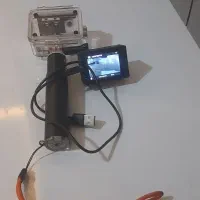 دوربین ثبت وقایع همراه با دسته نگهدارنده ضد آب