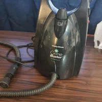 بخار شو و اتو پرده ایستاده