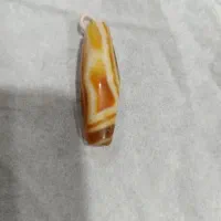 گوهر مهره سنگ از کار تیربند از جذبی جنس مخالف اصل
