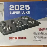 اجاق گاز و جاروبرقی super luxe