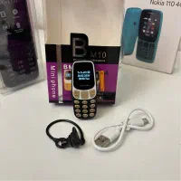 نوکیا بند انگشتی مینی دو سیم پلمپ همراه هدفون