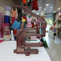 دستگاه پرس دکمه