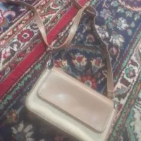 یک کیف کرمی قحوای درحدنو