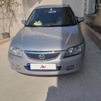 مزدا۳۲۳ اتومات مدل ۸۴ عروسک  تیپ ۵