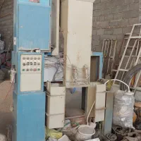 دستگاه بسته بند(گونی گیر)