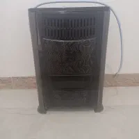 بخاری بهکاران و میز تلویزیون