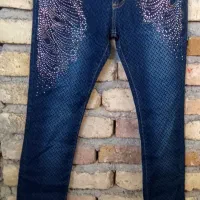 شلوار|لباس|کنگاور, |دیوار