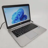 لپ‌تاپ باریک و لمسی فوق‌العاده تمیز و سالم